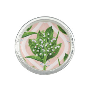 Bouquet of lilly of the valley flowers on pink ring
