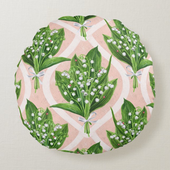 Bouquet of lilly of the valley flowers on pink round pillow (Front)