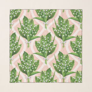 Bouquet of lilly of the valley flowers on pink scarf