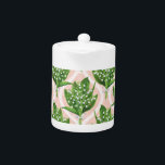 Bouquet of lilly of the valley flowers on pink teapot<br><div class="desc">Bouquet of painted with watercolors lily of the valley flowers seamless pattern design</div>