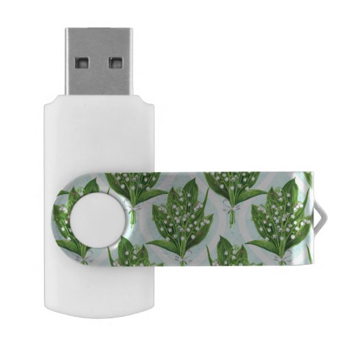 Bouquet of lily of the valley flowers on blue flash drive