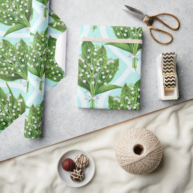 Bouquet of lily of the valley flowers on blue wrapping paper (Crafts)