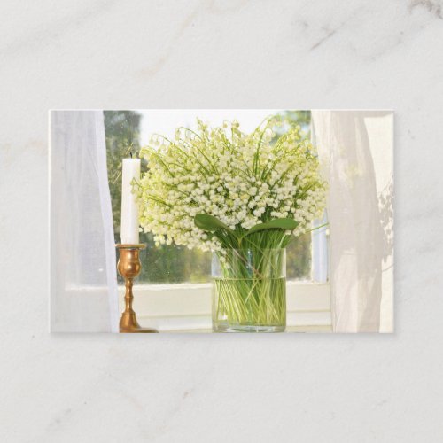 Bouquet of spring flowers lilies of the valley business card