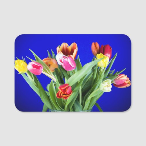 Bouquet of tulips on blue name tag