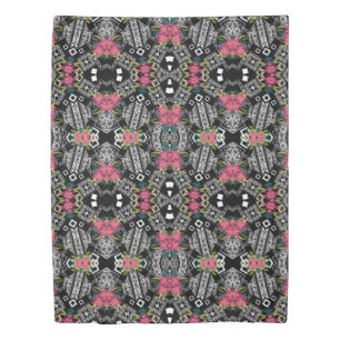Bouquets of pink flowers flowers on a geometric duvet cover