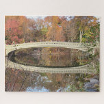Bow Bridge Scenic Reflection Autumn Central Park Jigsaw Puzzle<br><div class="desc">Bow Bridge in Central Park may seem far away today but it will be your own to enjoy when completed. A beautiful view of Bow Bridge in Central Park. Any design questions, just send an email to charmdesignstudio@rcn.com and we'll be delighted to assist. Currently sized at 11"x14" and 250 pieces,...</div>