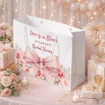Bow Love is in Bloom pink florals Bridal Shower Large Gift Bag<br><div class="desc">White background decorated with a pink colored bow and pink roses,  flowers. Personalize and add a name
Text: Love is in Bloom</div>