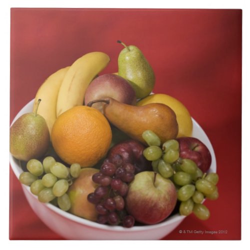 Bowl of fresh fruits ceramic tile