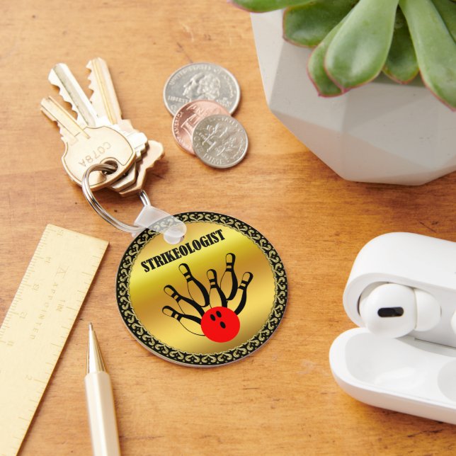 Bowling ball and pins with the word STRIKEOLOGIST Keychain (Desk)