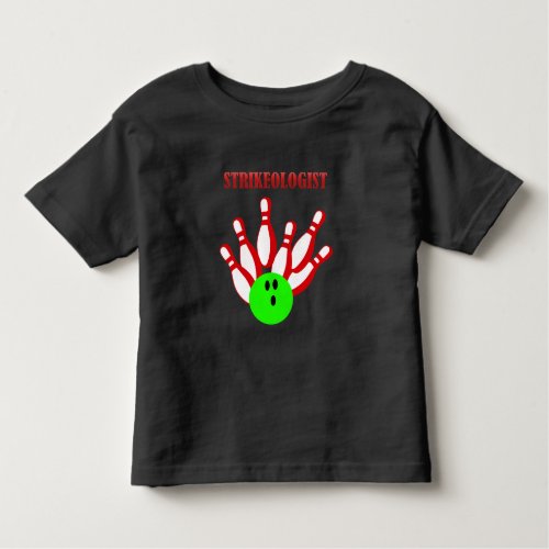 Bowling ball and pins with the word STRIKEOLOGIST Toddler T_shirt