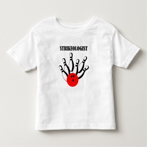 Bowling ball and pins with the word STRIKEOLOGIST Toddler T_shirt