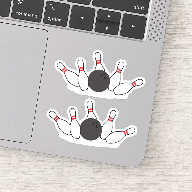 Bowling ball knocking down pins sticker Zazzle