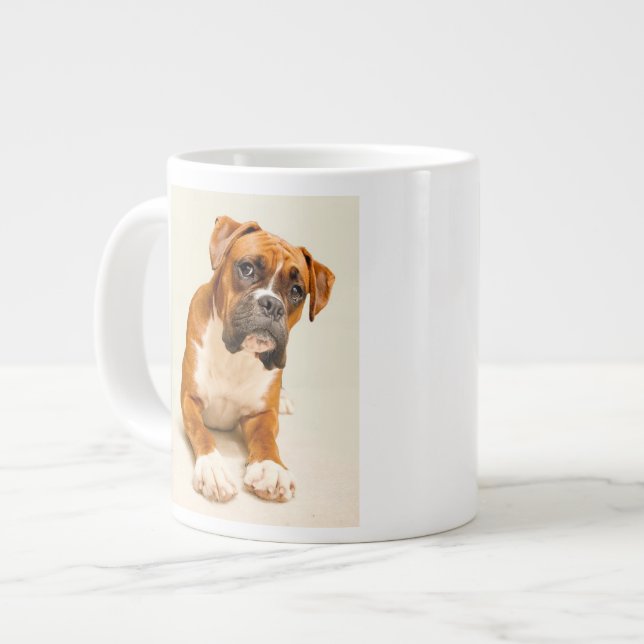 Boxer puppy on ivory cream backdrop. giant coffee mug (Front Left)