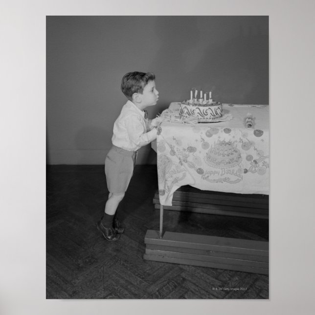 Boy Blowing Out Candles Poster (Front)
