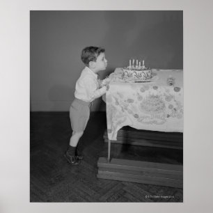 Boy Blowing Out Candles Poster
