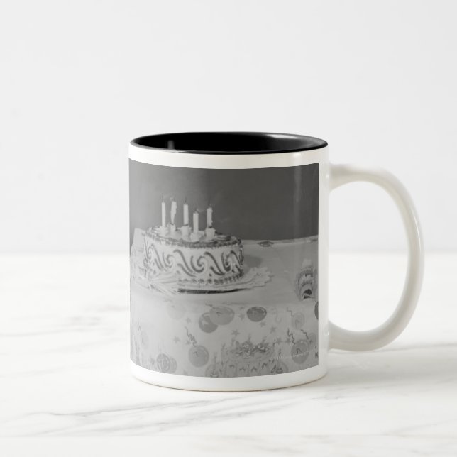 Boy Blowing Out Candles Two-Tone Coffee Mug (Right)