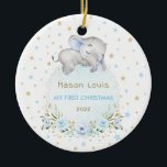 Boy Elephant Blue Gold Stars Baby 1st Christmas Ceramic Ornament<br><div class="desc">This adorable Christmas ornament features elegant blue roses,  soft botanical greenery in green and gold,  and an adorable sleeping baby elephant lying on a soft blue floral moon. Click the "customize further" button if you wish to re-arrange and format the style and placement of the text.</div>