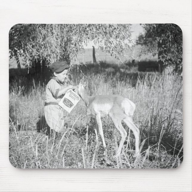 Boy feeding antelope mouse pad (Front)