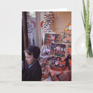 Boy in front of early 1940s Christmas Display Holiday Card