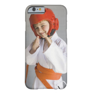 Boy in karate uniform wearing sparring headgear barely there iPhone 6 case
