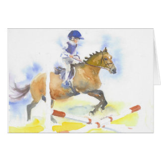 Boy jumping on his pony