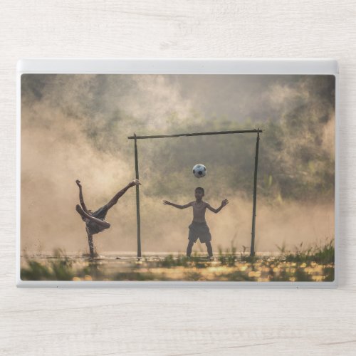 Boy kicking a football in the water EliteBook 840 HP Laptop Skin