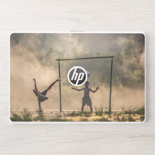 Boy kicking a football in the water G7 Notebook HP Laptop Skin