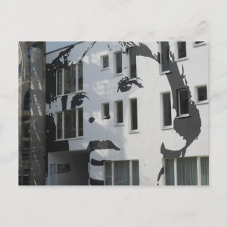 boy on wall postcard