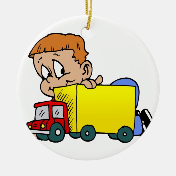 Boy playing with truck christmas tree ornaments