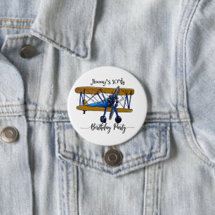 Boys birthday party with blue and yellow biplane button