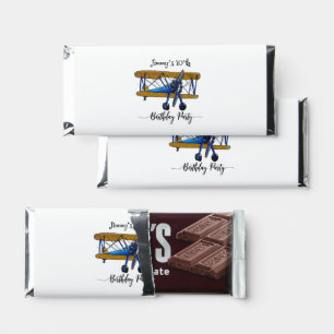 Boys birthday party with blue and yellow biplane hershey bar favors