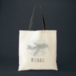 Boys Blue Airplane Travel Design with Name Tote Bag<br><div class="desc">This transport themed airplane tote bag design features a hand-drawn doodle airplane with a background of blue sky and clouds,  and can be personalized with your boy's name. Perfect for an airplane and travel loving kid! Check out our store for other cute designs.</div>