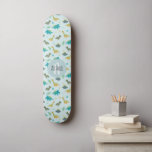 Boys Cool Blue Dinosaur Pattern Kids Skateboard<br><div class="desc">This modern and cool kids skateboard design features a dinosaur pattern,  with a t-rex and triceratops print on a blue background,  and can be personalized with your boys name and monogram. The perfect dino gift for any skateboard enthusiast.</div>