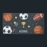 Boys Cool Blue Sports Gaming Star Desk Mat<br><div class="desc">This cool blue custom kids and teens gaming desk mat design features a blue cartoon sports design,  with a soccer ball,  basketball,  tennis racket,  football and trophy. There is also space for you to add your boys name in a sporty font. The perfect sport themed gift for any gamer!</div>