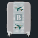 Boys Cute Blue Airplane Monogram Kids Luggage<br><div class="desc">This cute blue custom kids luggage design features a blue airplane illustration,  with a cloudy blue sky in the background. There is also space for you to add your boy's initials/monogram in a whimsical font—the perfect travel transport-themed gift for any aeroplane lover.</div>