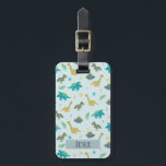 Boys Cute Blue Dinosaur Pattern Name Kids Luggage Tag<br><div class="desc">This cute and modern kids luggage tag features a dinosaur cartoon pattern, with a t-rex, stegosaurus, and Jurassic jungle plants, and can be personalized with your boys name and contact details. The perfect blue dinosaur-themed gift for your baby, toddler, or child's first trip. Check out our collection for the matching...</div>