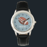 Boys Cute Sporty Football Kids Watch<br><div class="desc">This cute and modern kids watch features an American football,  with a blue background. The sporty watch can be personalized with your boys name,  and clear numbers,  the perfect gift for any sports or rugby lover.</div>