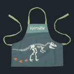 Boys Fun Dinosaur Dig Fossil Kids Apron<br><div class="desc">This cute and fun boys apron design features a t-Rex dinosaur skeleton. The apron can be personalized with your kids name - the perfect dinosaur fossil dig themed gift for any Dino enthusiast!</div>