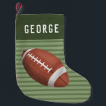 Boys Modern American Football Sports Kids Small Christmas Stocking<br><div class="desc">This cute and fun kids holiday Christmas stocking features a sports deign,  with an American football on green stripes. The stocking can be personalized with your boys name in cute typography. The perfect sporty Christmas keepsake for your baby,  toddler or any football lover this holiday season!</div>