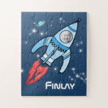 Boys name and photo rocket space kids jigsaw jigsaw puzzle<br><div class="desc">Test your kid's jigsaw puzzle skills with this personal blast off rocket space boys blue jigsaw puzzle.  Change the photo in the spaceship to your own fun little astronauts photograph. Jigsaw illustrated and design by Sarah Trett for www.mylittleeden.com</div>