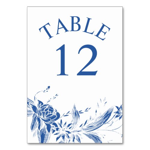Branch with blue and white flowers wedding table number