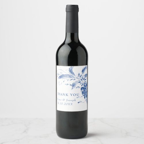 Branch with blue and white flowers wedding wine label