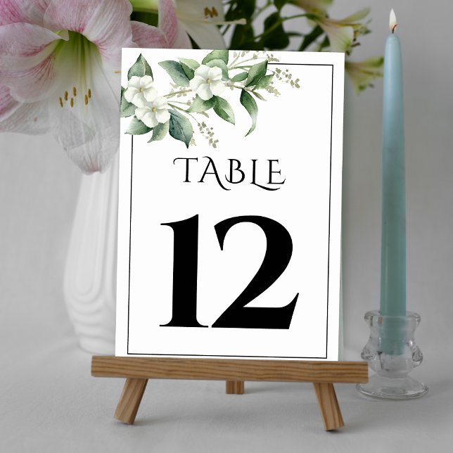 Branch with greenery and white flowers wedding table number (Creator Uploaded)