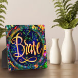 Brave Floral Encouraging Pretty Inspirivity  Plaque<br><div class="desc">‘Word of the Year’ plaques are a great reminder to ‘live your word’ everyday. “Brave” is a great word choice that will surely take your life in a positive direction this year. This hand whimsical illustration adds some cheer to any room you set it in and is a fun way...</div>