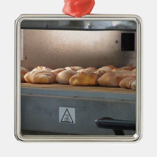 Bread freshly made into the oven metal ornament