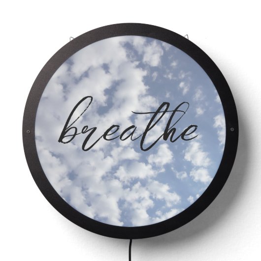 Breathe Handwritten Script over Clouds On Blue Sky LED Sign (Lights Off)