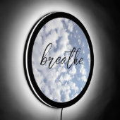 Breathe Handwritten Script over Clouds On Blue Sky LED Sign (Angle)