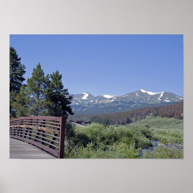 Breckenridge Bike Bridge and Snow Capped Mountains Poster (Front)