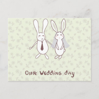 Bridal shower invitation with two cute rabbits in