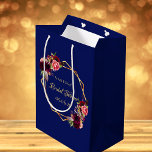 Bridal Shower navy blue florals burgundy Medium Gift Bag<br><div class="desc">A trendy and stylish Bohemian boho style for a bridal shower. Decorated with watercolored roses in burgundy and pink. Elegant navy blue background. A faux gold geometric frame. Templates for the bride's name and a date. With the text: Bridal Shower written with a hand lettered style script, faux gold colored...</div>